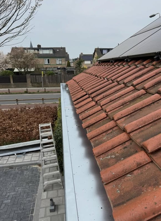 Bakgoot volledig op maat vernieuwd in zink